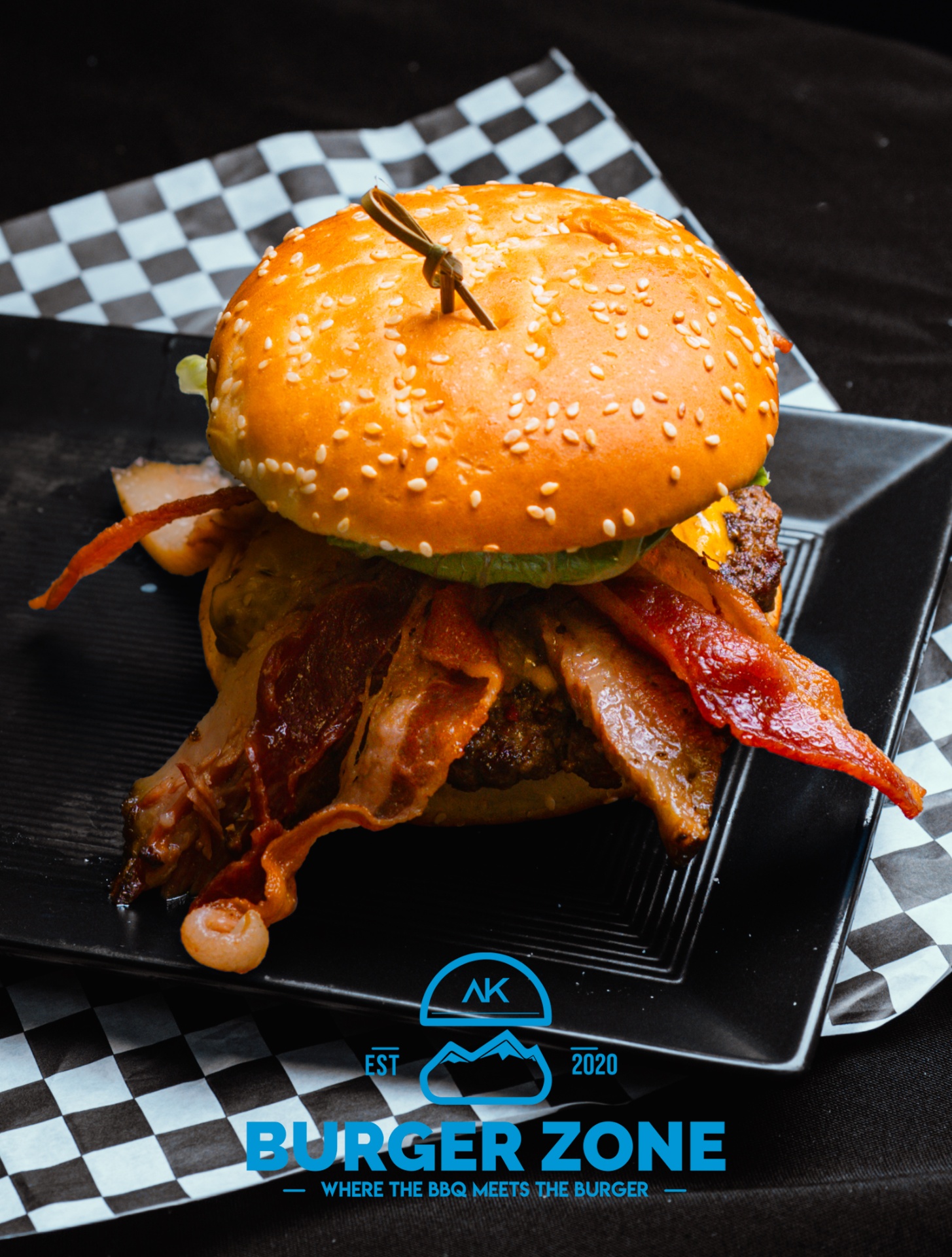 Bacon burger with AK Burger Zone branding